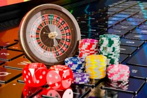 Online gambling, concept. Casino roulette with dice and tokens o